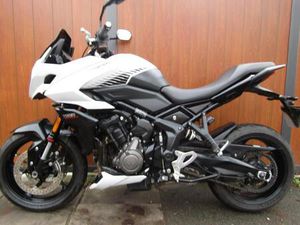 TRIUMPH TIGER 660 SPORT , WITH TRIUMPH ALARM AND SPOT LIGHTS . LOW MILES .