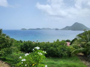 Terrain constructible 1986 m2 vue mer Proche plage à Terre