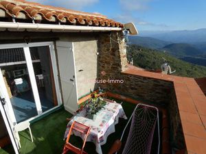Maison en pierre  6 pièces avec solarium et petit jardin