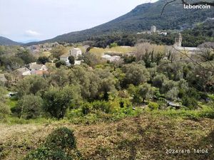 Beau terrain avec vue panoramique sur le centre du village de Luri et aperçu mer  avec CUO