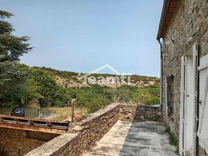 Maison en pierre avec terrain