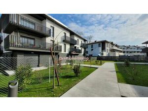 APPARTEMENT 4 PIECES DUPLEX DE 115M2 AVEC BALCON DE 11 M2 ET PARKING EN SOUS SOL