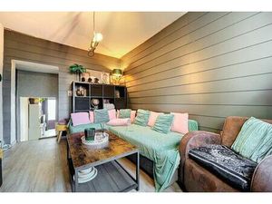 Maison deux façades avec passage latéral et deux chambres