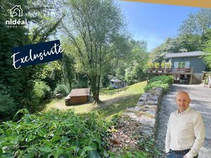 Maison en bois atypique dans un environnement idyllique