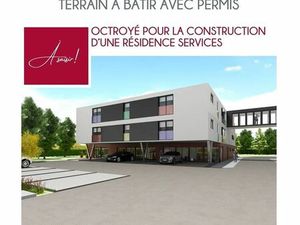 Terrain avec permis octroyé pour la construction d'une résid
