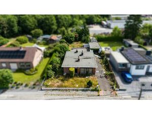 Bouwgrond met vergunning voor tweewoonst!