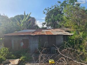 Parcelle de terrain viabilisée d'environ 600m² quartier au calme proche centre Ravine des 