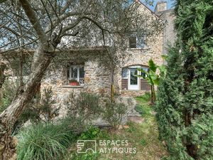 Maison en pierre avec jardin et studio indépendant.