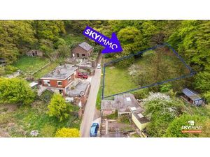 MAGNIFIQUE TERRAIN À WANDRE AVEC PROJET DE 3 LOG ET GARAGES