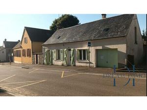 Maison de village avec jardin  granges et garage.