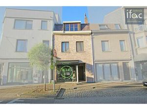 Opbrengsteigendom met 2 flats en handelsruimte Tervuren