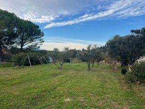 Vente terrain 1100 m² à Mas-Blanc-des-Alpilles (13103)  290 000 €