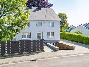 Maison 4 façades avec jardin et parkings