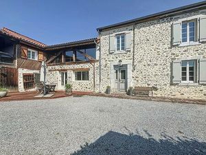 Maison pierres apparentes avec trois logements