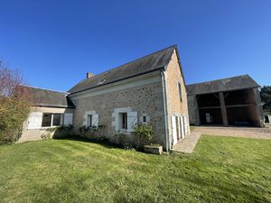 Propriété avec grange sur terrain de 2400 m2.