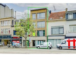 Vergund appartementsgebouw met 3 appt  handelsglvl en tuin in Merksem!