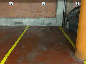 Emplacement de parking dans garage fermé à louer