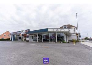 Surface commerciale de 450m2 avec habitation  facilités de