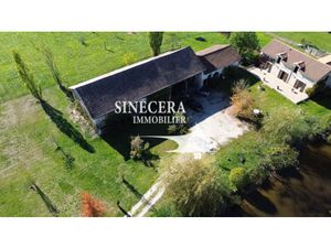 Propriété de 2 hectares comprenant une maison avec 5 chambre