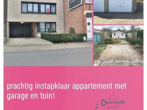 Gezellig appartement met garage en tuin .