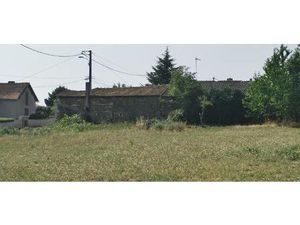 Terrain constructible 1400m2 avec bâtiment