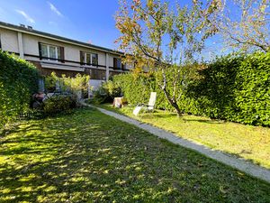 Maison mitoyenne + garage + cave + jardin