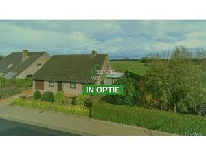 Reninge: Verzorgde gelijkvloerse woning met heel wat potentieel  fantastische tuin met ope