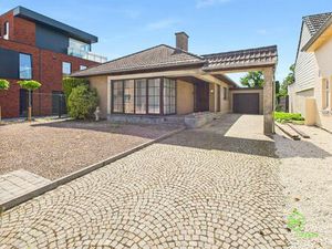 Gelijkvloerse woning op 12a 9ca in het centrum!