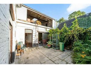 Woning met charme en mooie tuin in hartje Kalken