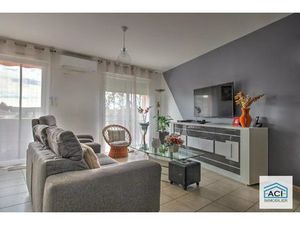 Appartement T3 de 76 m² avec balcon au centre de Luzinay