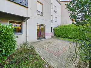 Appartement 2 pièces à Woippy en rez-de-chaussée avec jardin et parking