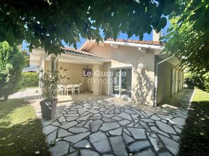 Maison de plain pieds avec garage et atelier