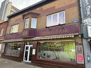 MAISON DE COMMERCE COMPRENANT PARTIE COMMERCIALE ET PRIVATIV