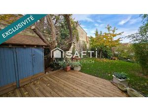 Une maison ou 2 appartements avec jardin !!!