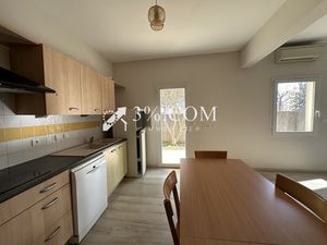 Appartement Type P3 lumineux en rez de chaussé avec jardin privatif et garage.