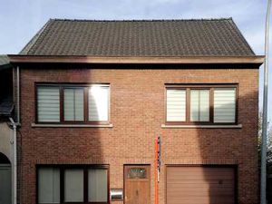 Maison 2 façades avec garage et jardin – centre d’Opwijk