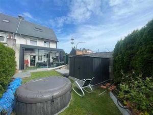 Maison 3 chambres avec véranda et jardin.