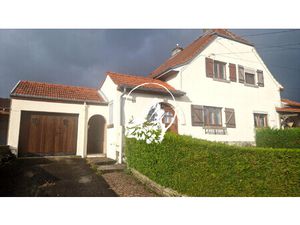 Maison mitoyenne avec fort potentiel – secteur calme