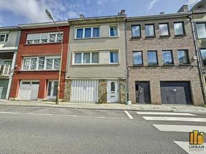 Maison de rapport comprenant 2 apparts 1 ch  avec garage et