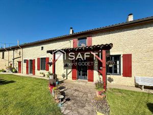 Maison ancienne en pierre proche commerces.