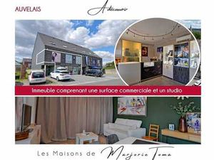 Immeuble comprenant une surface commerciale et un studio