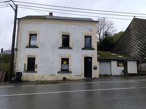 Maison à rénover avec jardin et garage