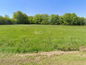 Beau terrain à bâtir de 21 ares