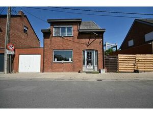 Te renoveren woning met 3 slaapkamers  garage en tuin.