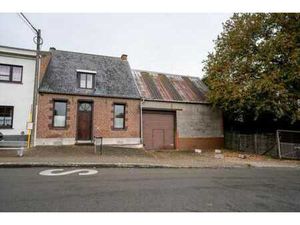 Maison avec grand hangar au fort potentiel