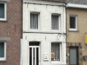 Maison 2 façades sise Place de Rebaix 15 à Rebaix