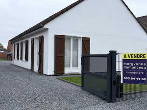 Un plain pied dans un beau quartier