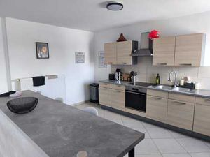 Appartement 2 chambres 100 m² + place de parking