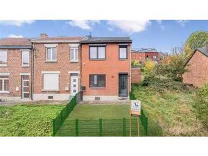 Maison 3 façades rénovée avec jardin