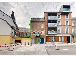 Maison mixte de 3 façades avec rez commercial